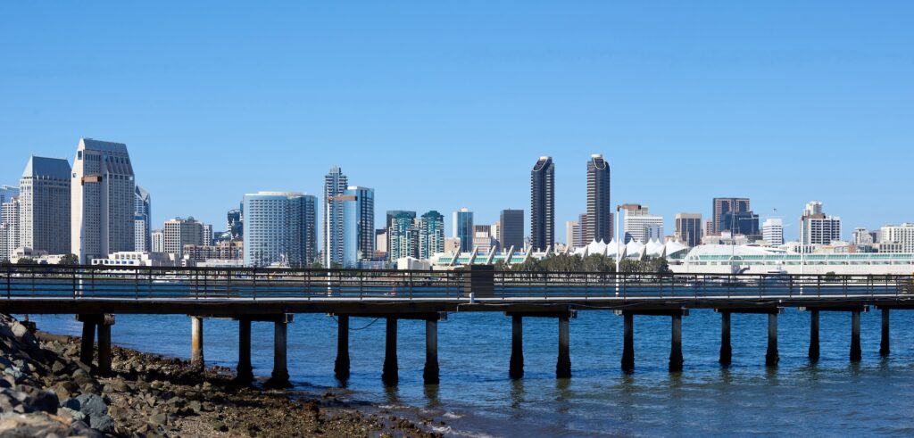Panoramic view of San Diego pier with downtown cityscape in the background, Southern California